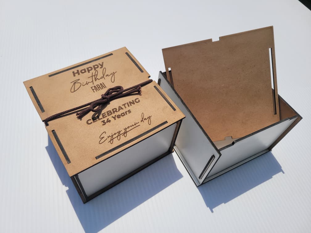 Image of a wood engraved gift box done by visual extra media